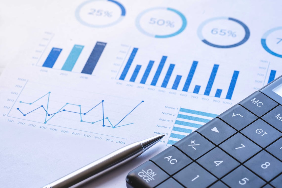 calculator-steel-pen-and-financial-data-with-gra-2026-01-08-02-24-40-utc